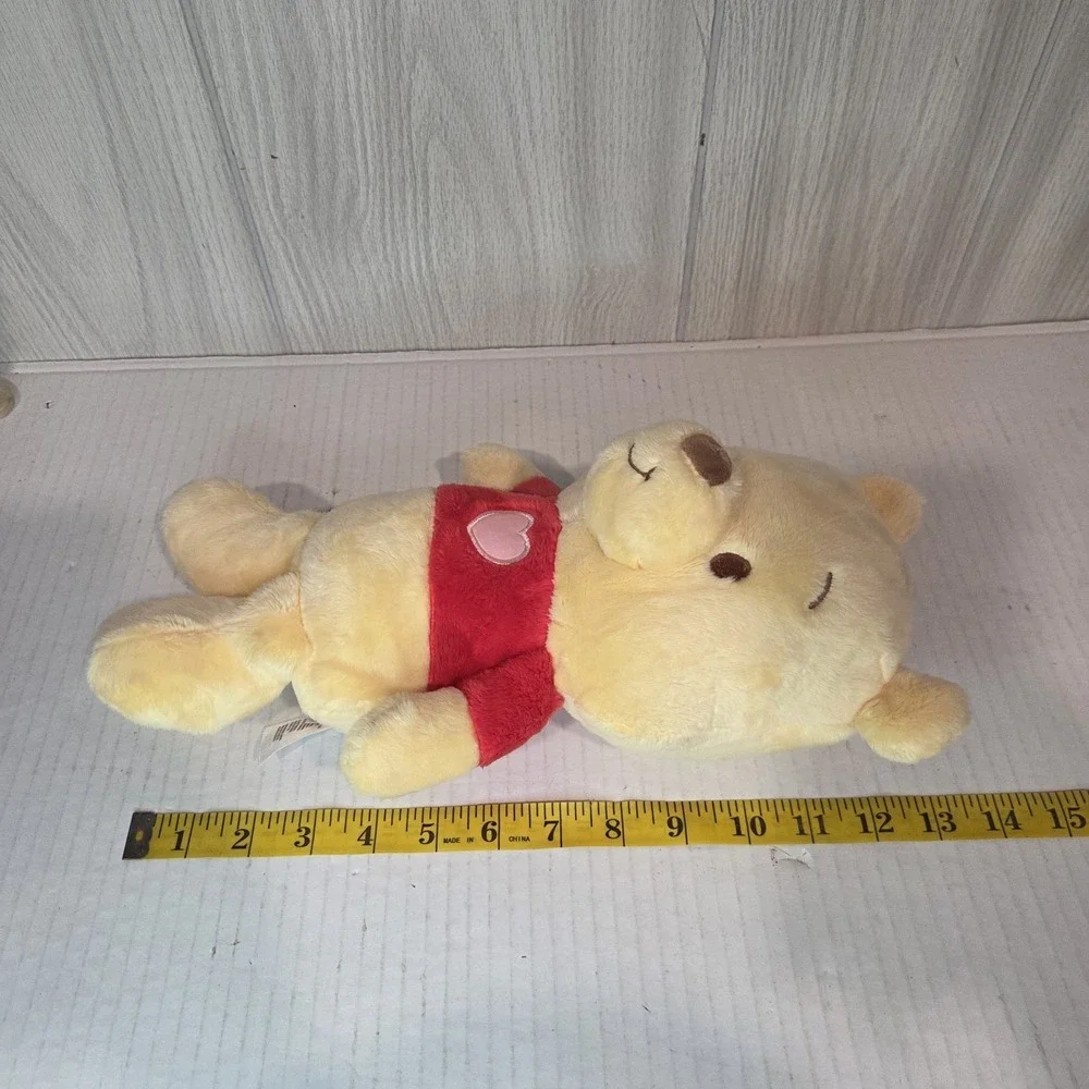 Disney Baby Winnie the Pooh Stuffed Animal, crinkle hands, heart emblemed